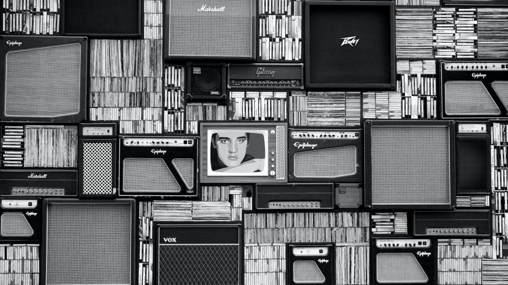 Aatmanirbhar essential - A black and white abstract picture of different kinds of media.
