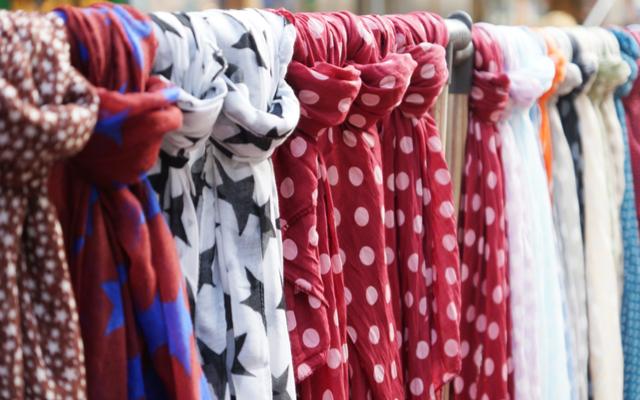 Stoles hanging in street shopping of India, Mg Road Pune